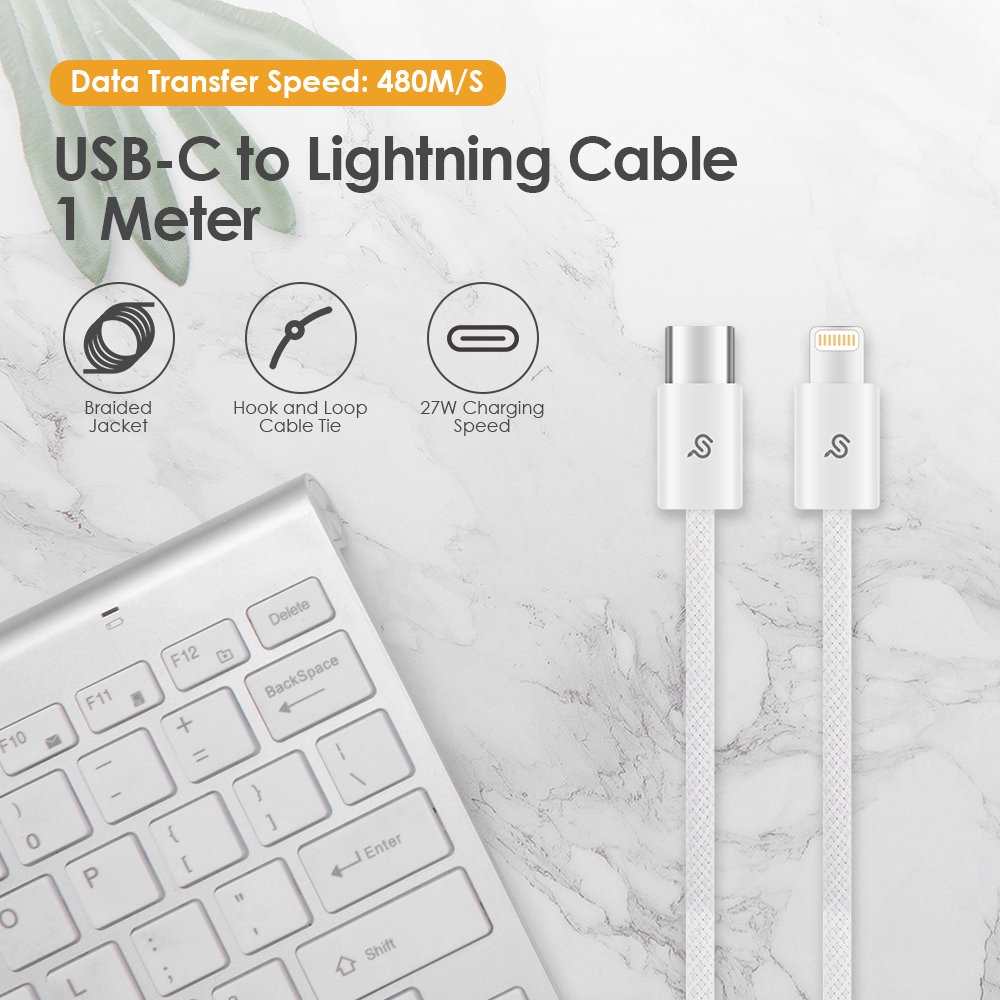 A 1-meter white braided USB-C to Lightning cable, equipped with a cable tie, next to a white keyboard