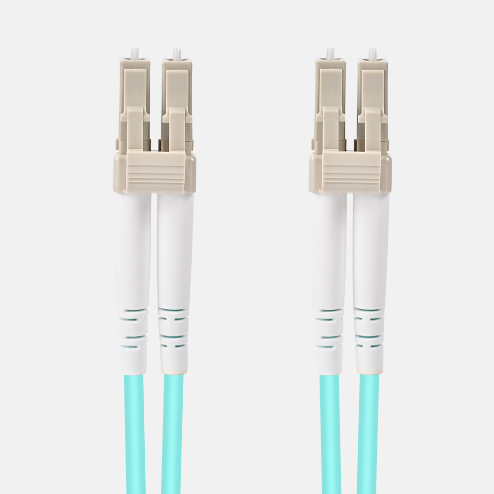 PrimeCables' aqua multimode OM4 fiber patch cable with beige LC to LC duplex connectors