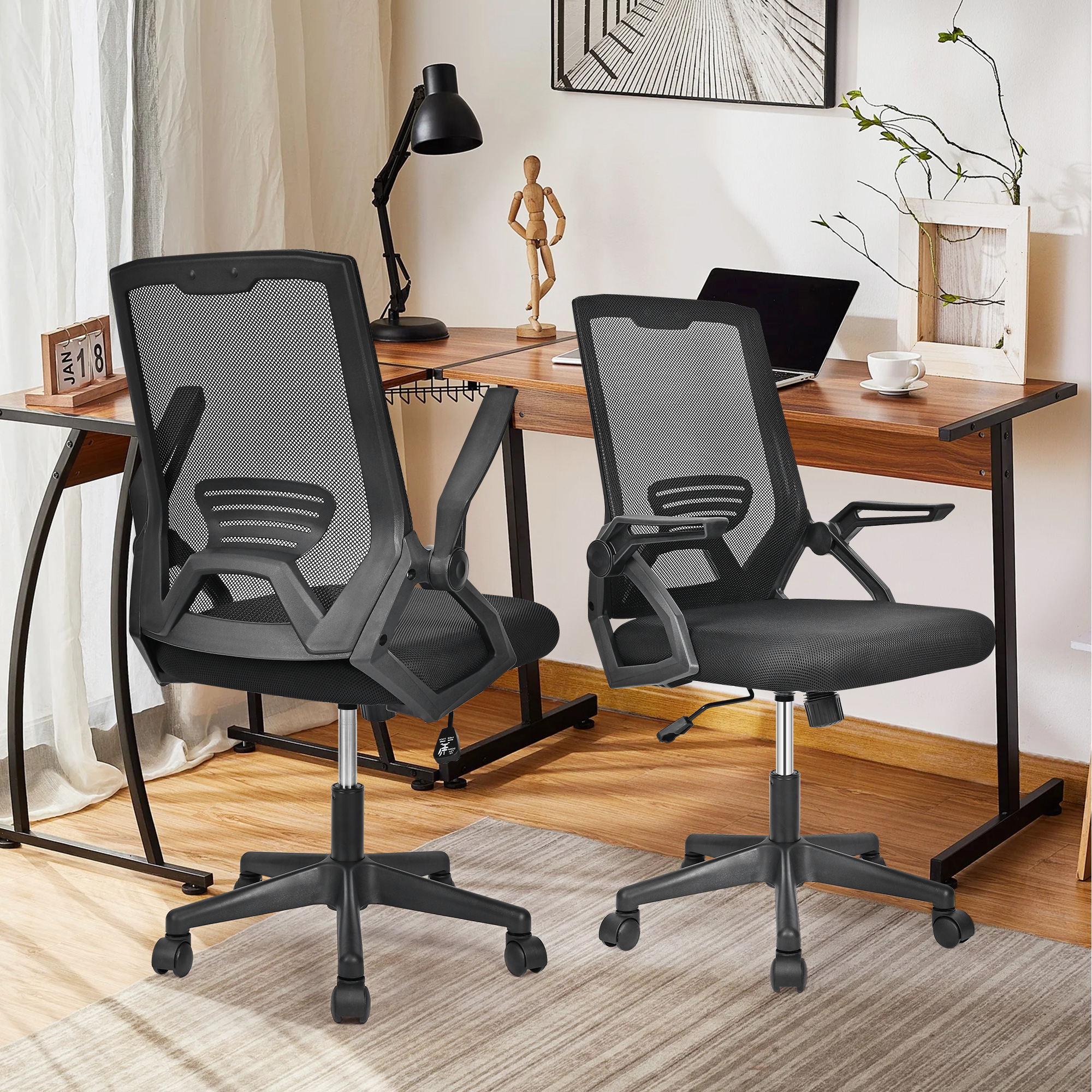 The front and rear view of this Moustache® black ergonomic mesh office chair (with lumbar support & flip-up arms)