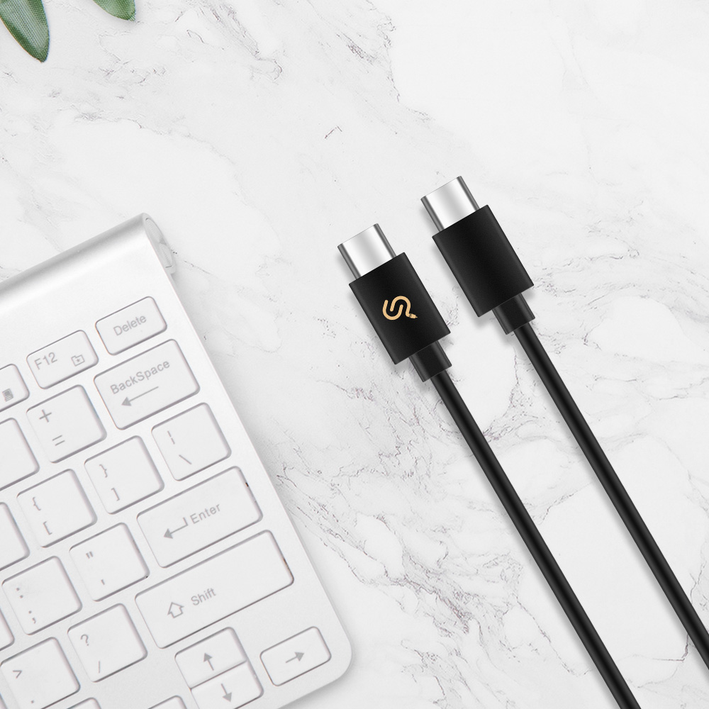 PrimeCables black USB 2.0 Type‑C charging & syncing cable placed next to a white keyboard on a marble tabletop