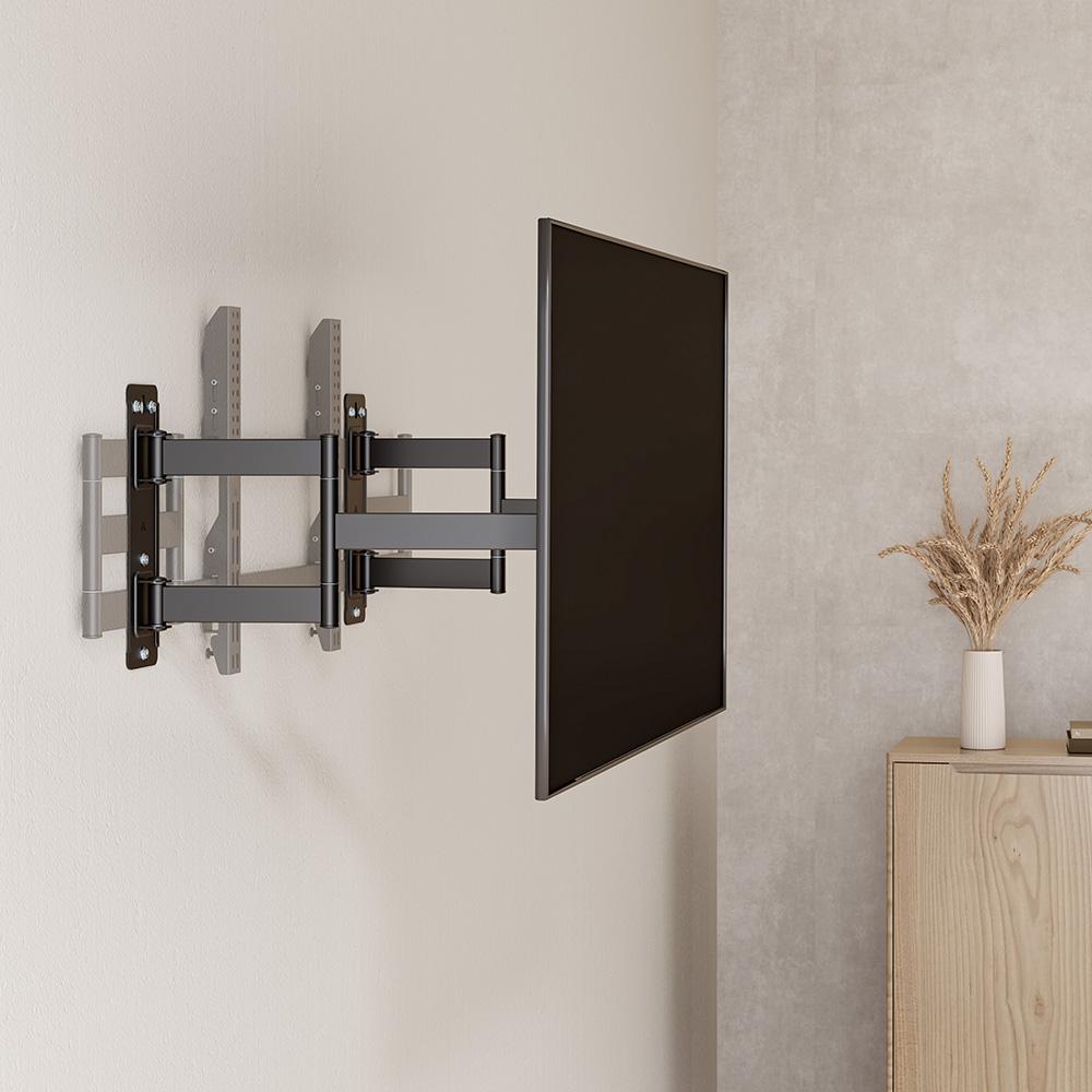 A large-sized TV is installed on a PrimeCables corner TV wall mount in the corner of the room