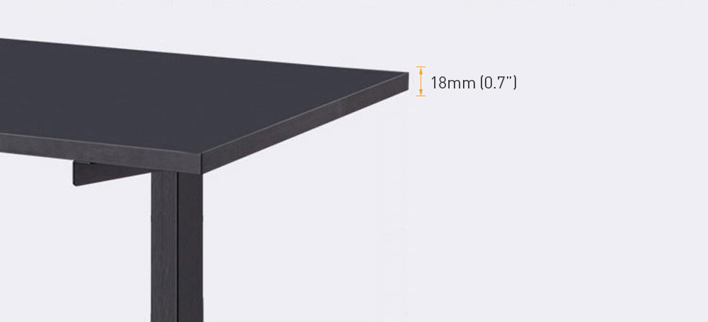 The black desk tabletop (frame not included) is 18 millimeters (0.7 inches) thick