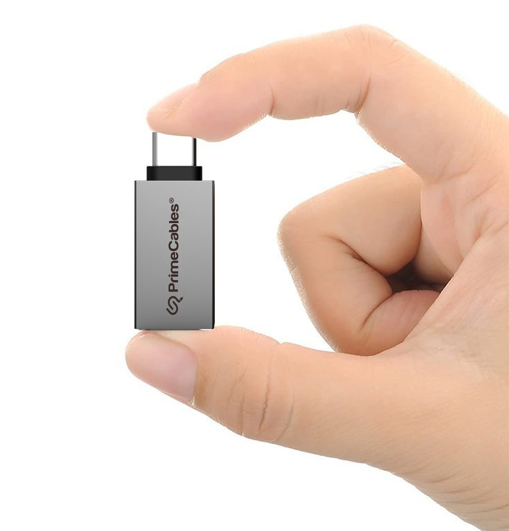 USB-C to USB-A adapter with a body about the size of a coin, which can be taken absolutely anywhere