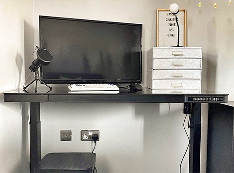 PrimeCables® Cab-PC-08211 with a computer and a microphone on top of the desk