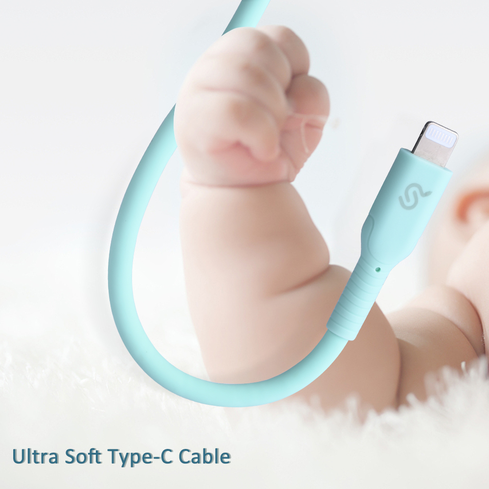 A curly mint green Type-C to Lightning data cable, demonstrating its ultra-soft and flexible features